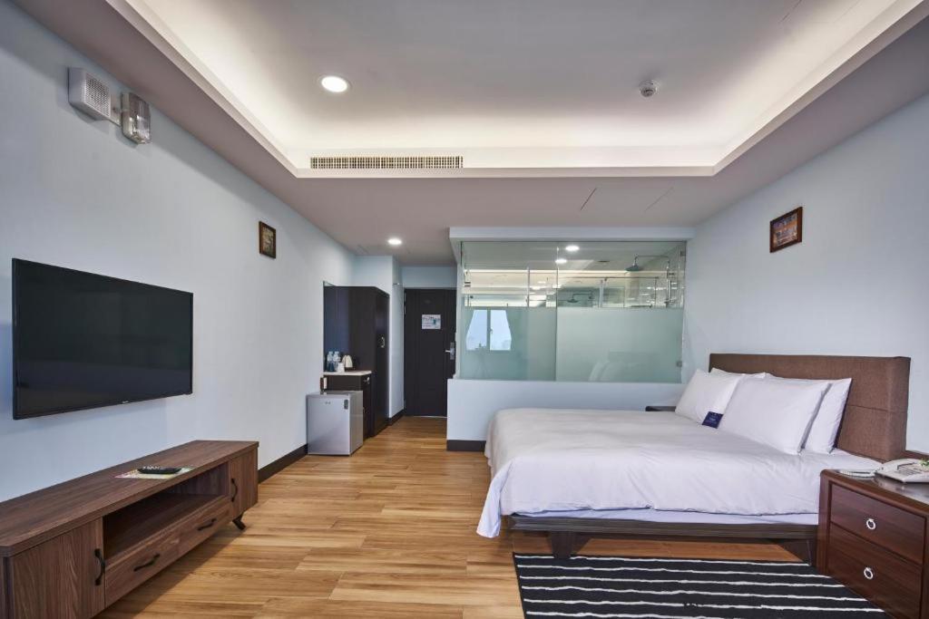 Menippe Hotel Kaohsiung Quarto foto
